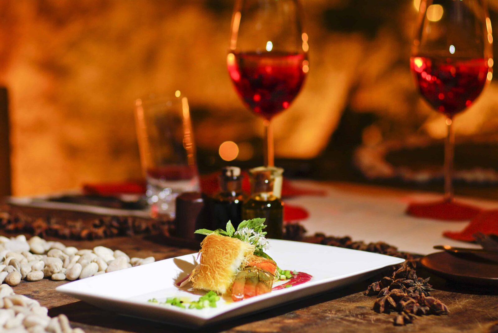Romantic salmon steak dinner with red wine