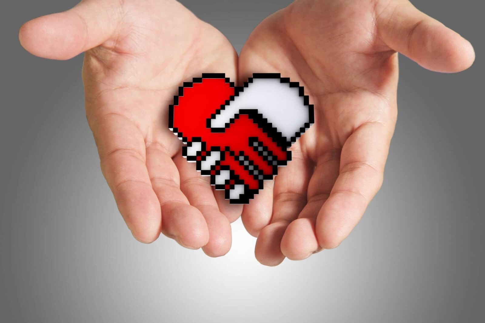 hand shows hand shake, heart shaped symbol as medical technology,clipping path